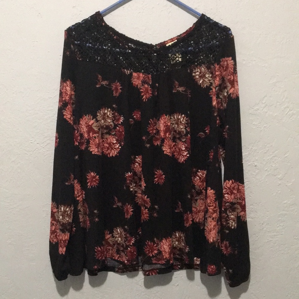 Floral Long Sleeve with a Crocheted Neck Portion.